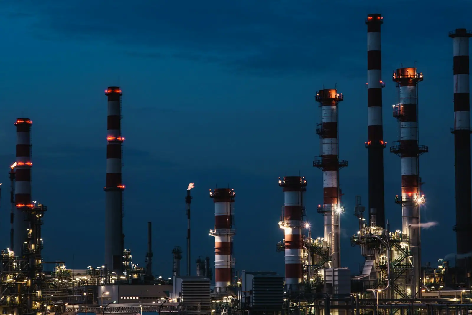 Industrial energy processing facility at dusk