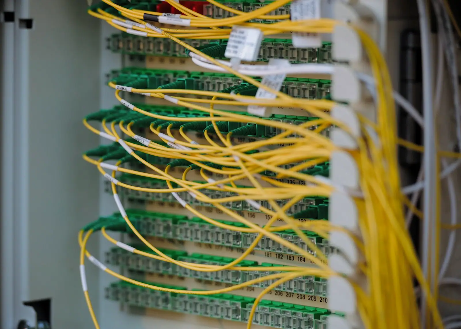 Data centre server aisle with network infrastructure